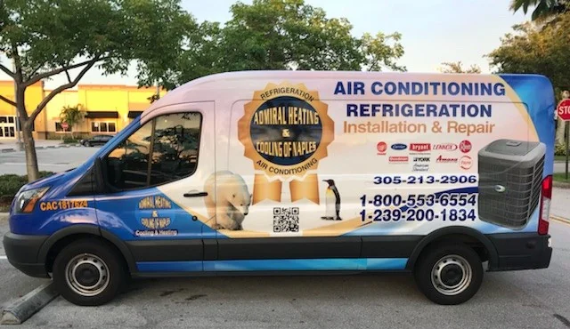 Blue and white wrapped Admiral Heating and Cooling of Naples service van lettered air conditioning refrigeration installation and repair with the equipment brands it services